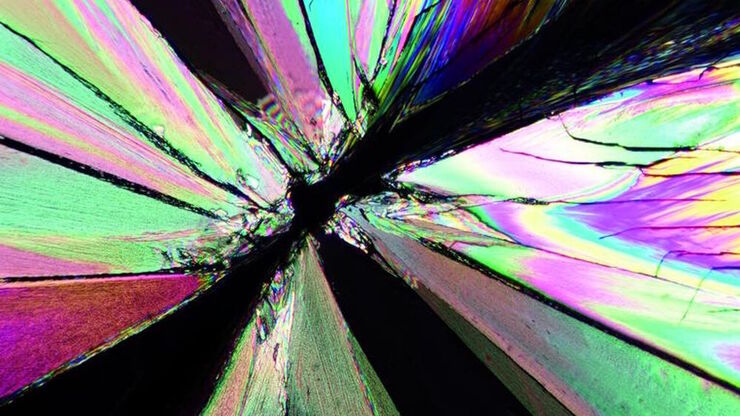 Image of a tartaric-acid crystal taken with polarization microscopy. Tartaric acid, a diprotic, aldaric carboxylic acid, is a naturally occurring organic compound notably found in grapes.